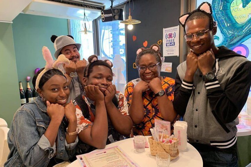 Having a great time in one of our maid cafes in Akihabar 