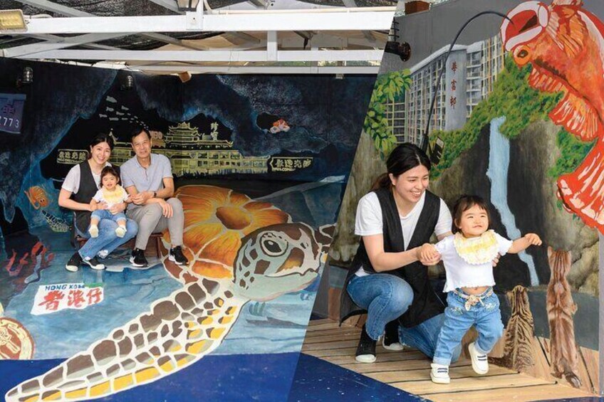 Hop upstairs to enjoy the view of the Fishing Village and take photos with 3D murals painted by local artists