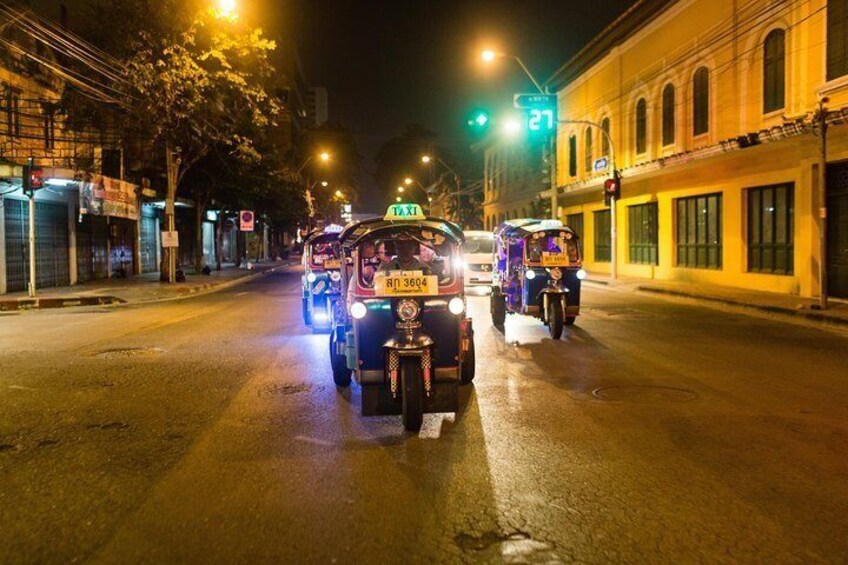 Two-passenger tuk-tuks are a fun way to travel, especially when traffic is lighter after dark.