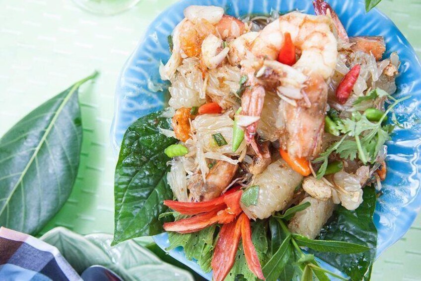 Learn to cook authentic Thai cuisine with a local