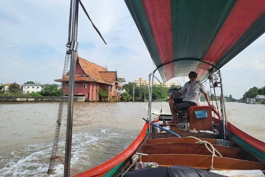 Long-tail boat ride through Bangkok's canals