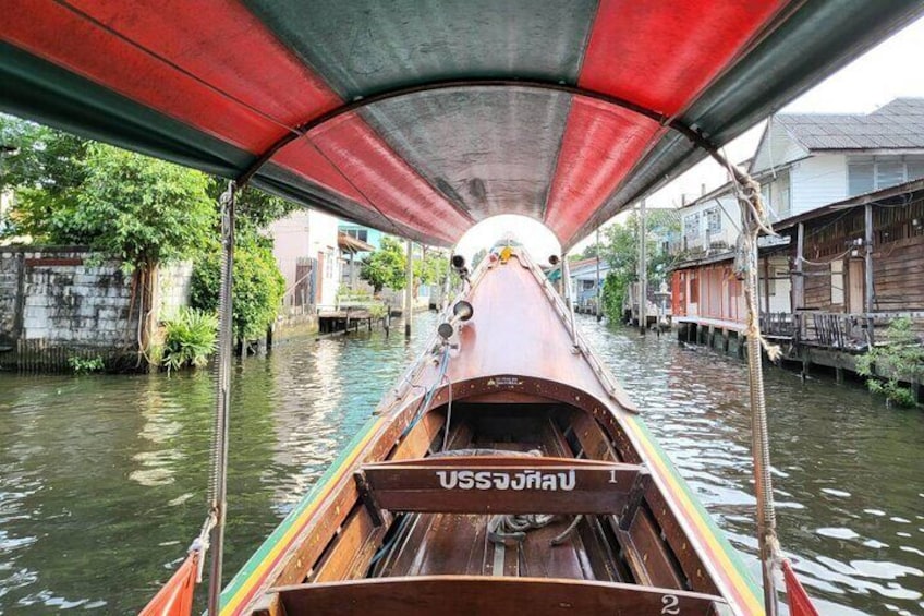 Long-tail boat ride through Bangkok's canals