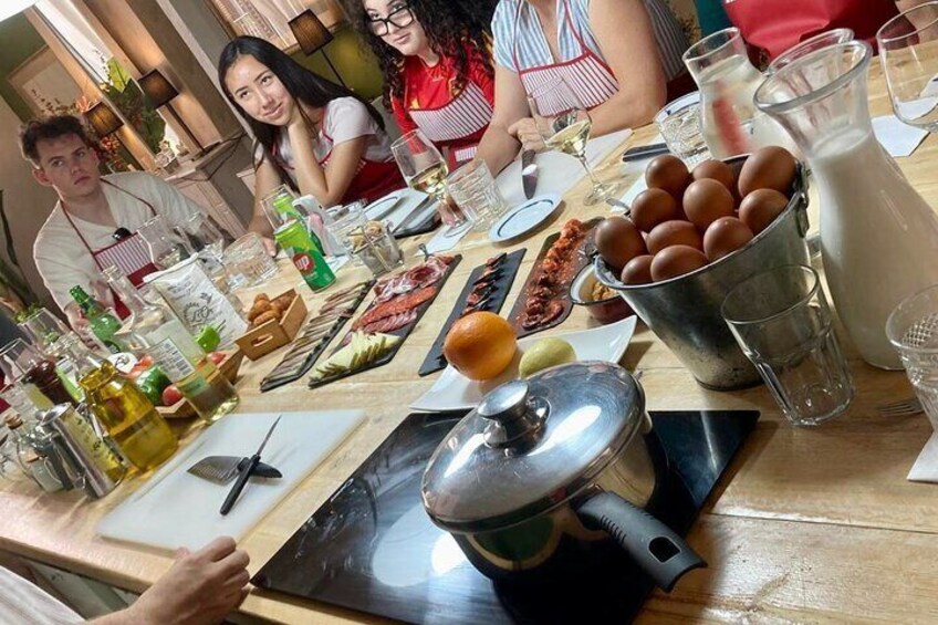 Premium Paella cooking class & 10 Spanish Tapas