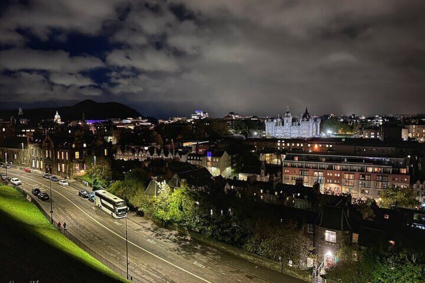 Evening view over Edinburgh from Edinburgh Castle Esplanade.