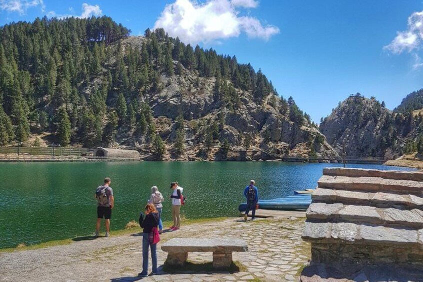 Walking around the lake with refreshing stop at Saint Gil spring.