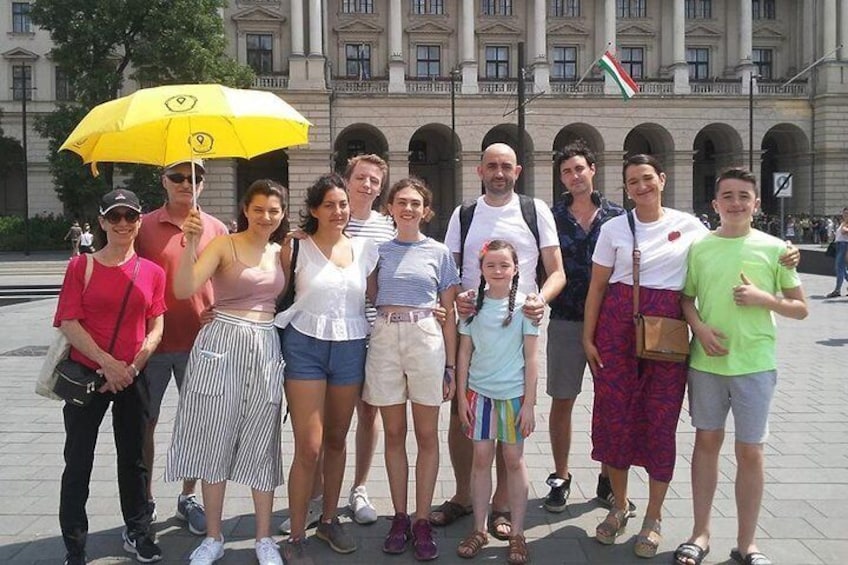 Tourists enjoying the free walking tour - at parliament square.
