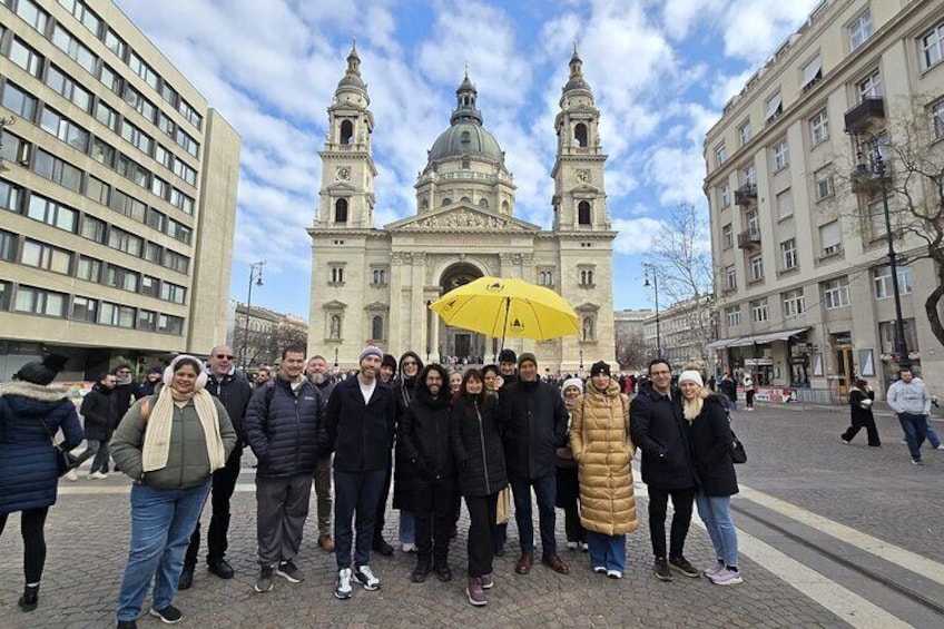 Peter the guide and his guests stood outside Saint Stephens. 