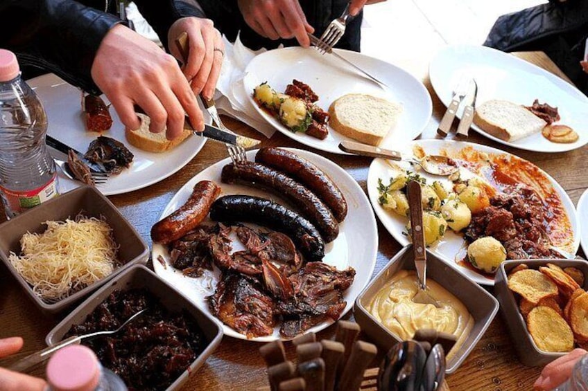 Lunch at a Budapest butcher, where we sample an array of traditional Hungarian dishes. 