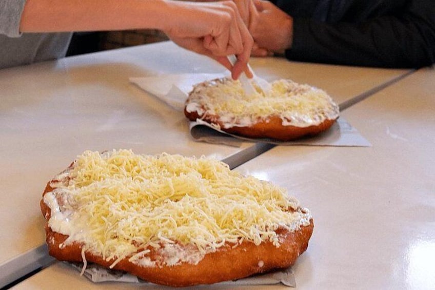 Lángos, a classic Hungarian street food ... paired with a shot of Unicum (not pictured).