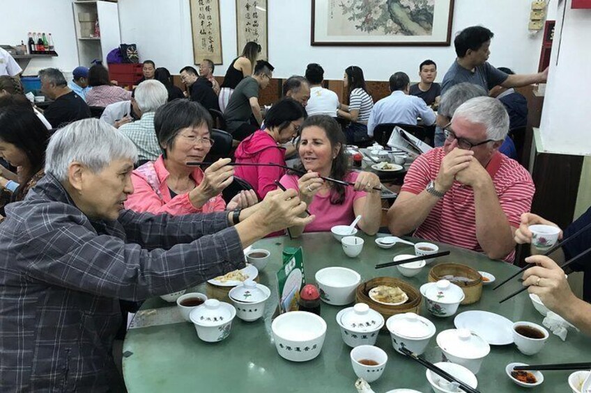 Have kind locals teach you how to hold your chopsticks