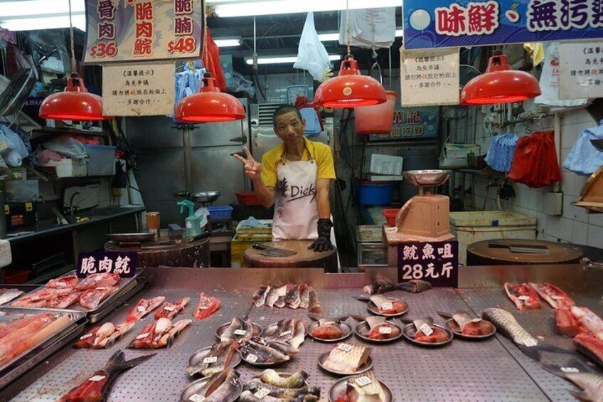 Visit a fish market to see where local people shop