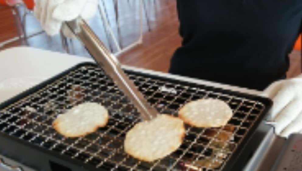 Show item 1 of 2. Experience handmade rice crackers at ORANDA Senbei Factory