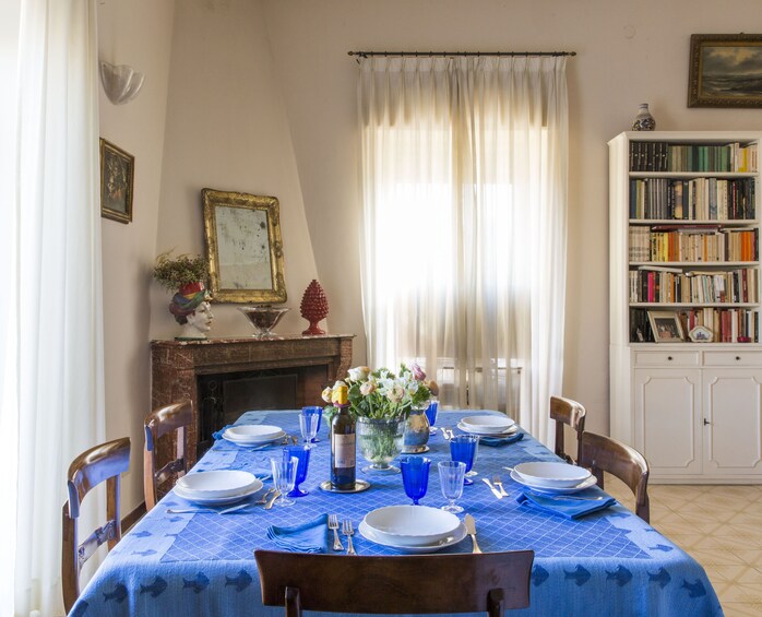 Lunch or dinner and cooking demo at a local home in Taormina