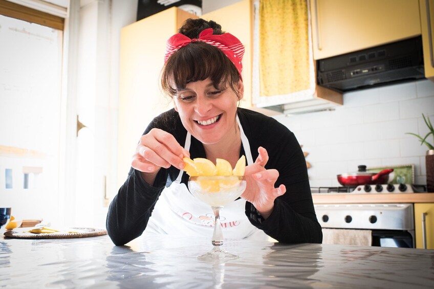 Lunch or dinner and cooking demo at a local home in Taormina