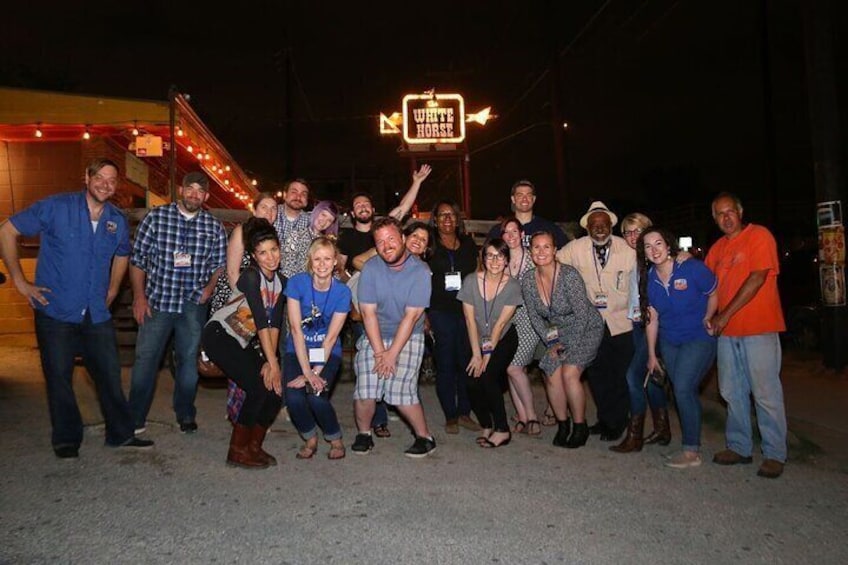 Group having fun outside The White Horse honky tonk