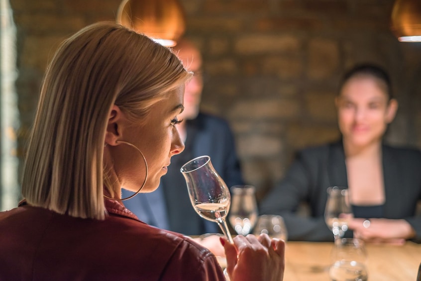 Woman at a wine tasting in Budapest 