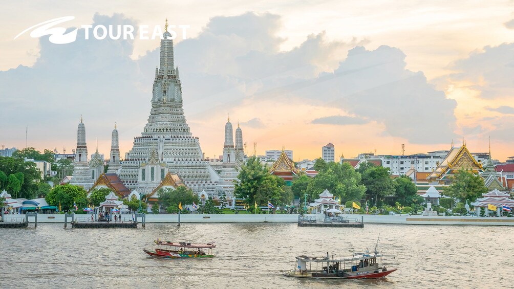 View of Wat Arun Temple over the water in Bangkok