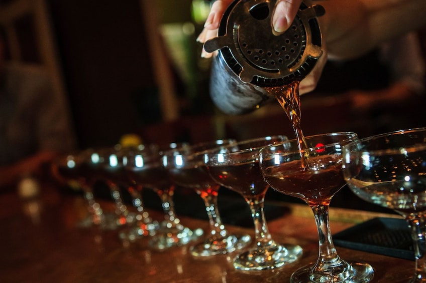 Bartender pouring cocktails in New Orleans