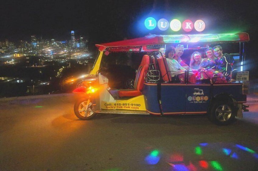 Up to 6 guests on board the electric powered Lucky Tuk Tuk for a night lights and sites tour of San Francisco