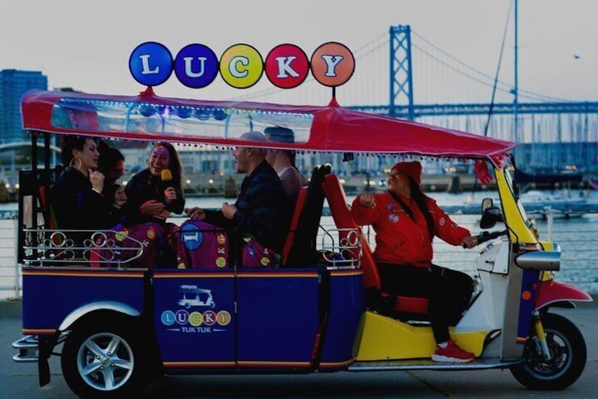 Lucky Tuk Tuk Lights and Sites tour at sunset along San Francisco Bay