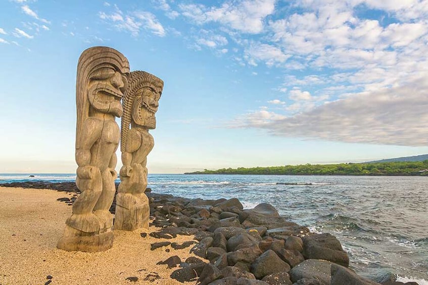 Tiki statues on the beach in Hawaii