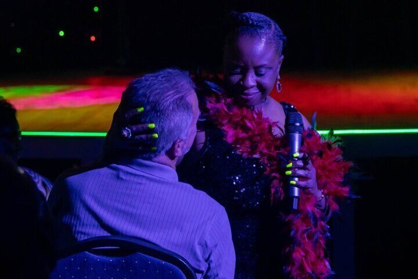 Cast Member interacting with VIP Seating