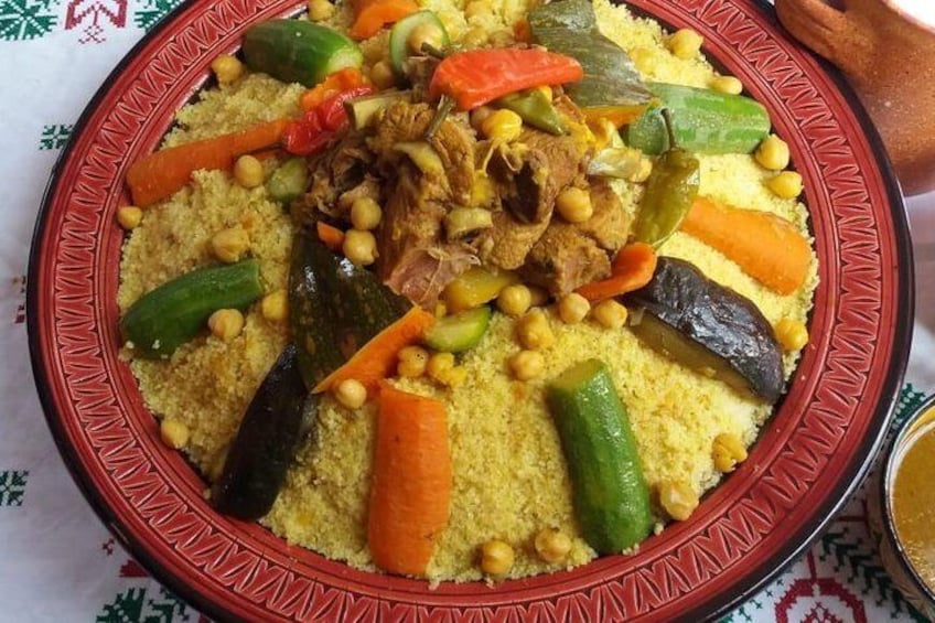 Agadir Camel riding and moroccan couscous dish with Hotel Transfers