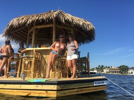 Take a 2 hour private Tiki Boat Tour along the waterways.