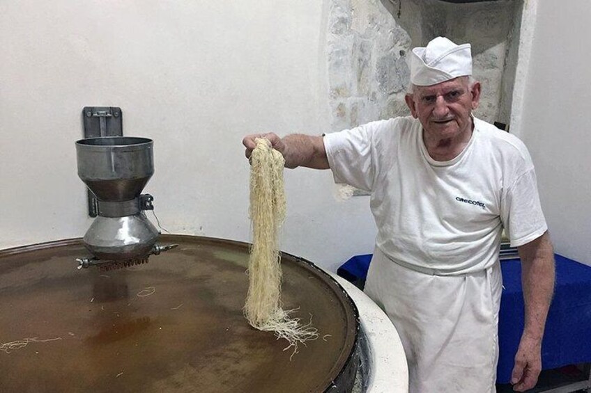 Giorgos Hatziparashos making kadaifi