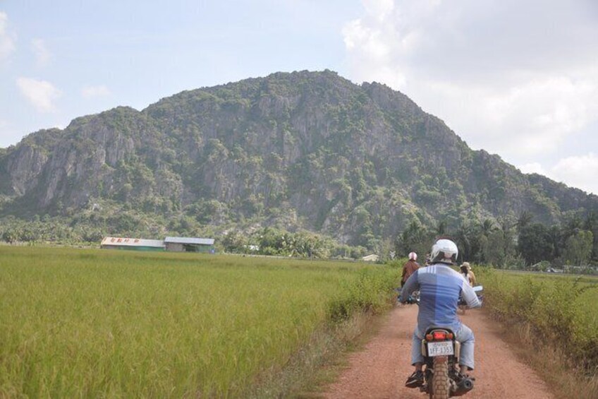 Show item 1 of 2. Kampong Trach Mountain Exploration