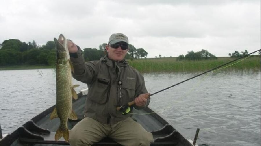 Pike fishing by boat.Lough Corrib,Connemara.English/French speaking Ghillie