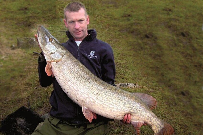 Pike fishing by boat.Lough Corrib,Connemara.English/French speaking Ghillie