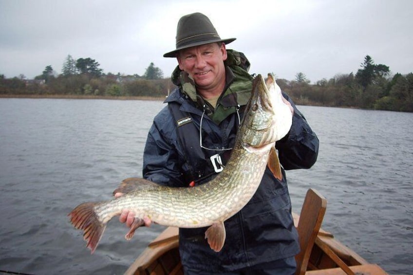 Pike fishing by boat.Lough Corrib,Connemara.English/French speaking Ghillie