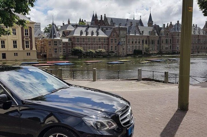 Your luxury vehicle in front of the Binnenhof.