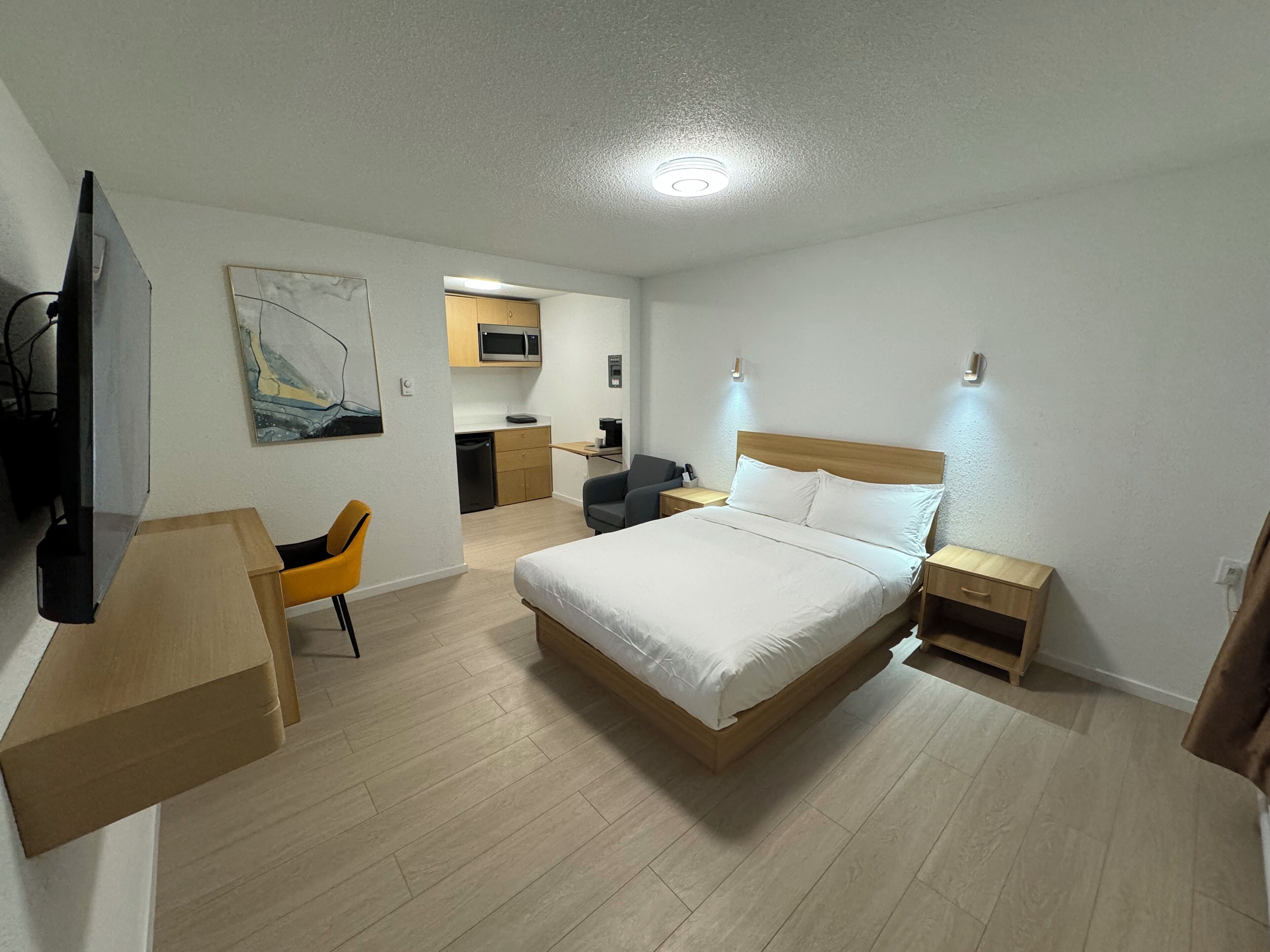 Habitación cuádruple Deluxe | Sábanas de algodón egipcio y ropa de cama de alta calidad 