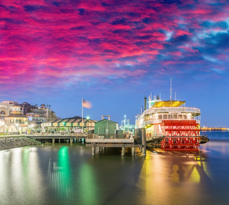 Steamboat Natchez on the Mississippi River at sunset, New Orleans.