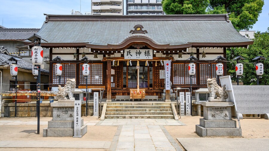 Osaka Tenmangu Shrine with traditional architecture and serene grounds in Osaka, Japan.