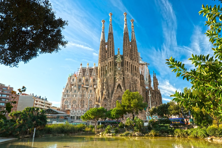 Exterior view of the Sagrada Família basilica in Barcelona, showcasing its intricate architecture.