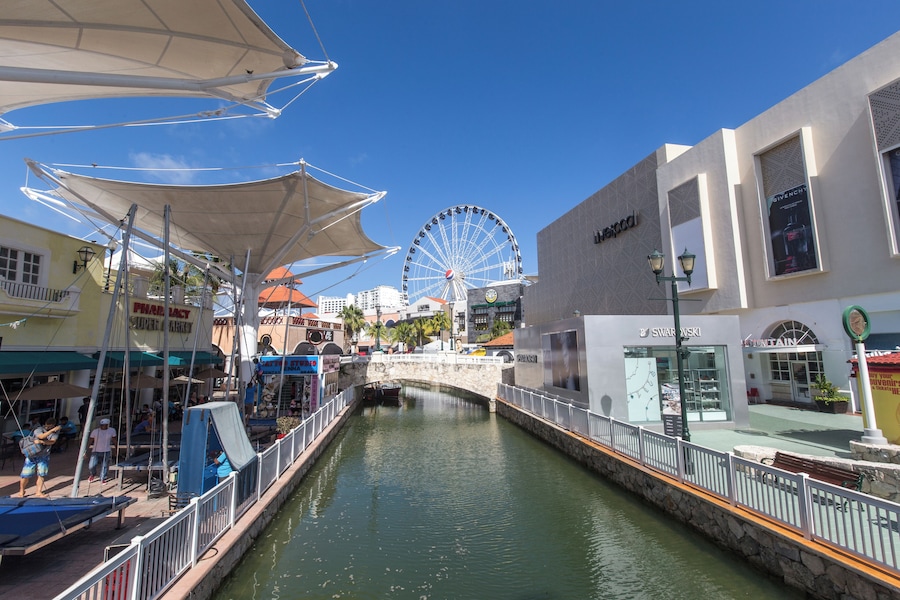Open-air shopping and canal rides at La Isla Shopping Village in Cancun, Mexico.