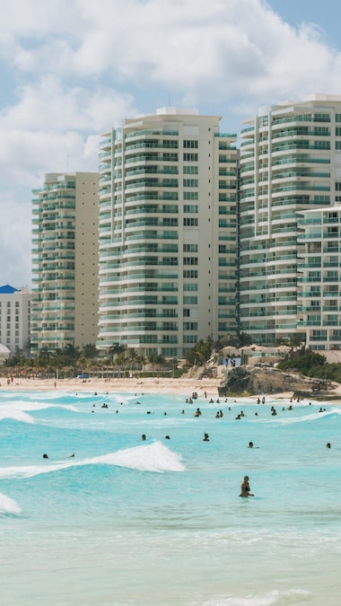 Turquoise waters and soft sand at Playa Chac Mool in Cancun, Mexico.