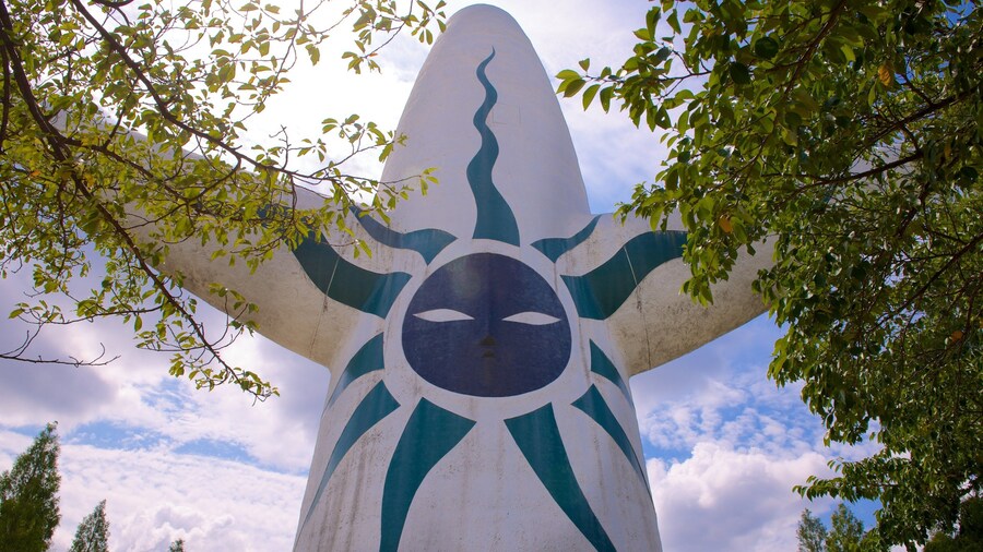 Expo ’70 Commemorative Park with the iconic Tower of the Sun and lush greenery in Osaka, Japan.